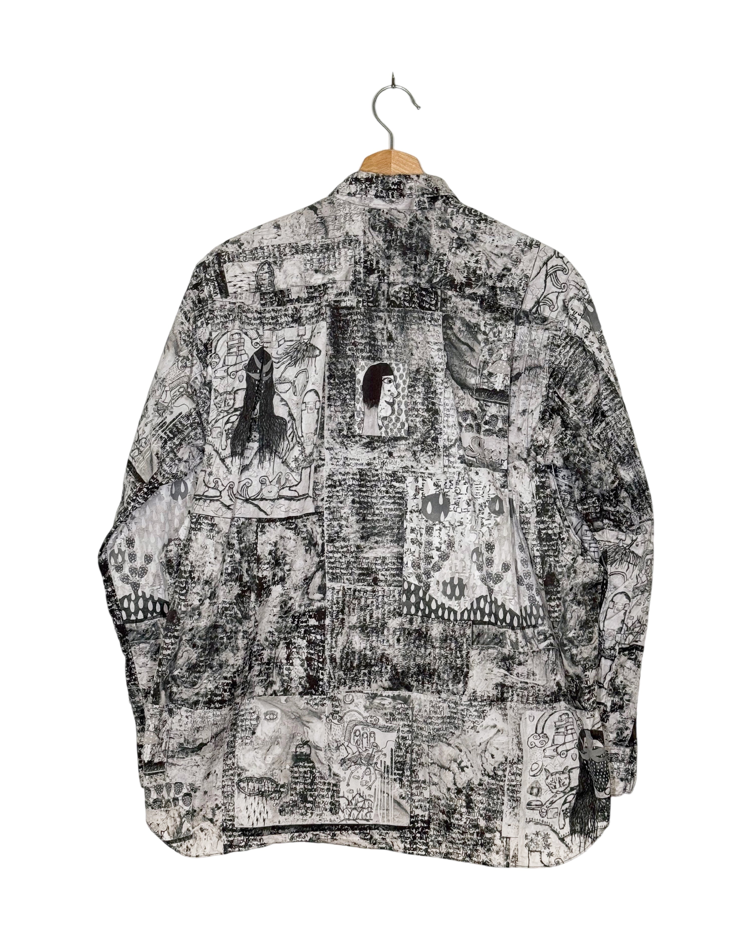 Comme des Garcons Shirt 2023SS Brett Westfall graffiti cut-out shirt - back view on hanger