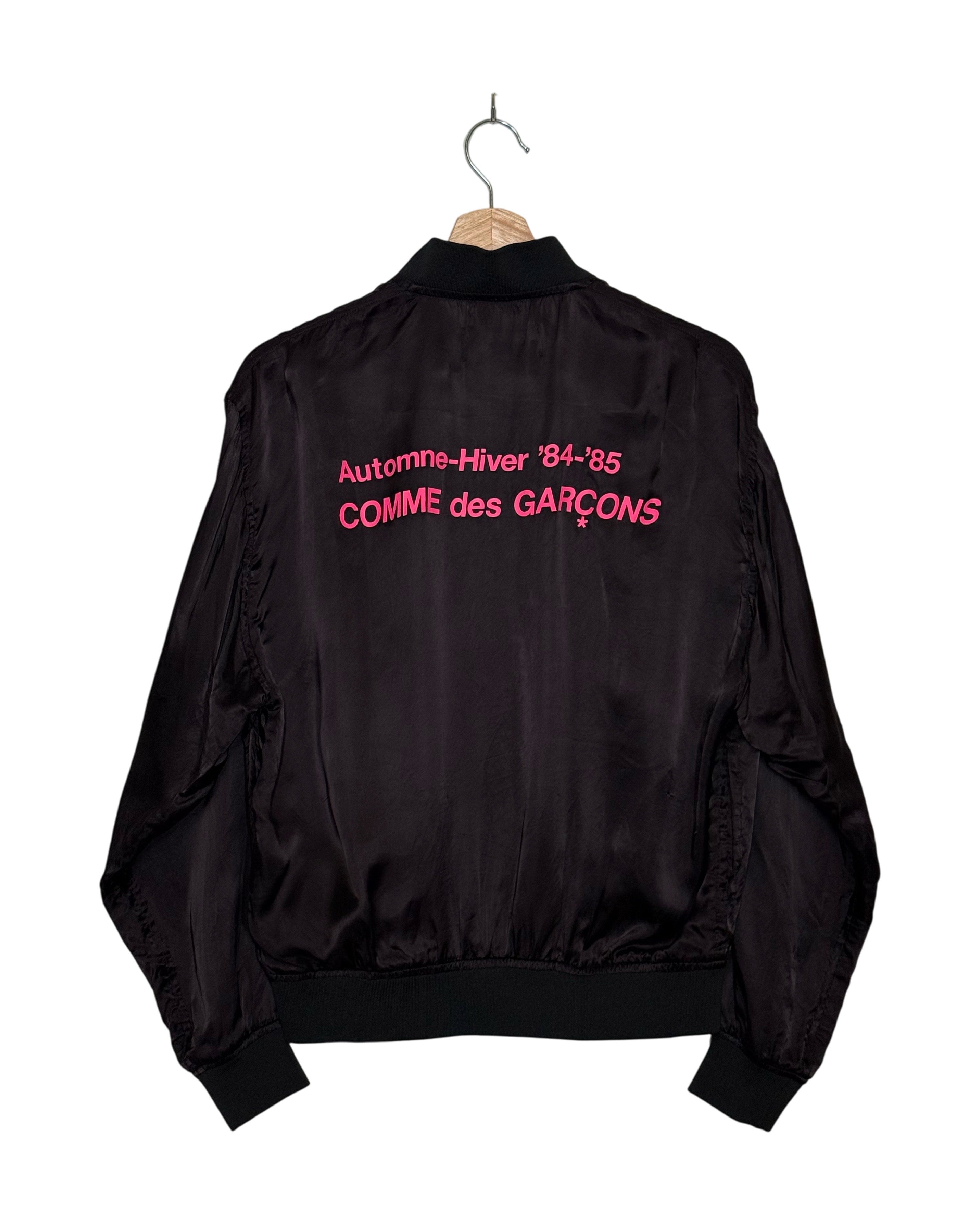 Comme des Garcons 2018SS Hankyu Umeda exclusive cupro staff blouson - front view on hanger, fluid magenta cupro with AW84-85