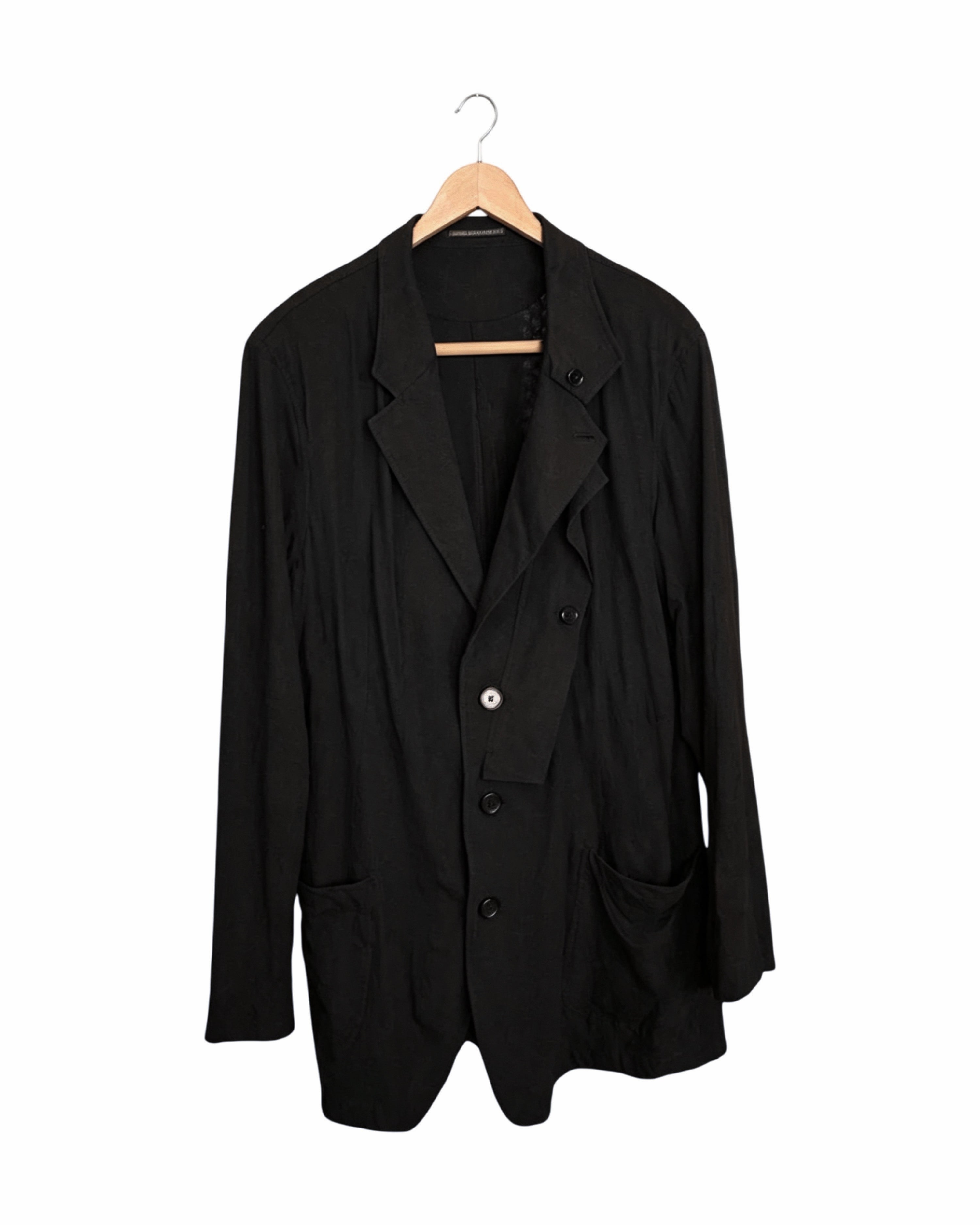 Yohji Yamamoto Pour Homme 2012SS asymmetric button blazer - front view on hanger, single-breasted with deliberately