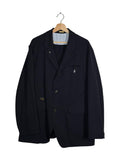 Undercover the Shepard 2025SS striped distressed blazer - front view on hanger, raw-cut chest welt pocket with embroidery and tonal zigzag topstitching