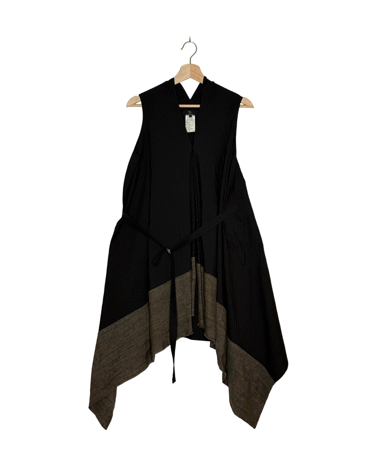 Y's 2016AW belt panel dress - front view on hanger, black panelled body with a mottled taupe hem border and a self-fabric tie belt