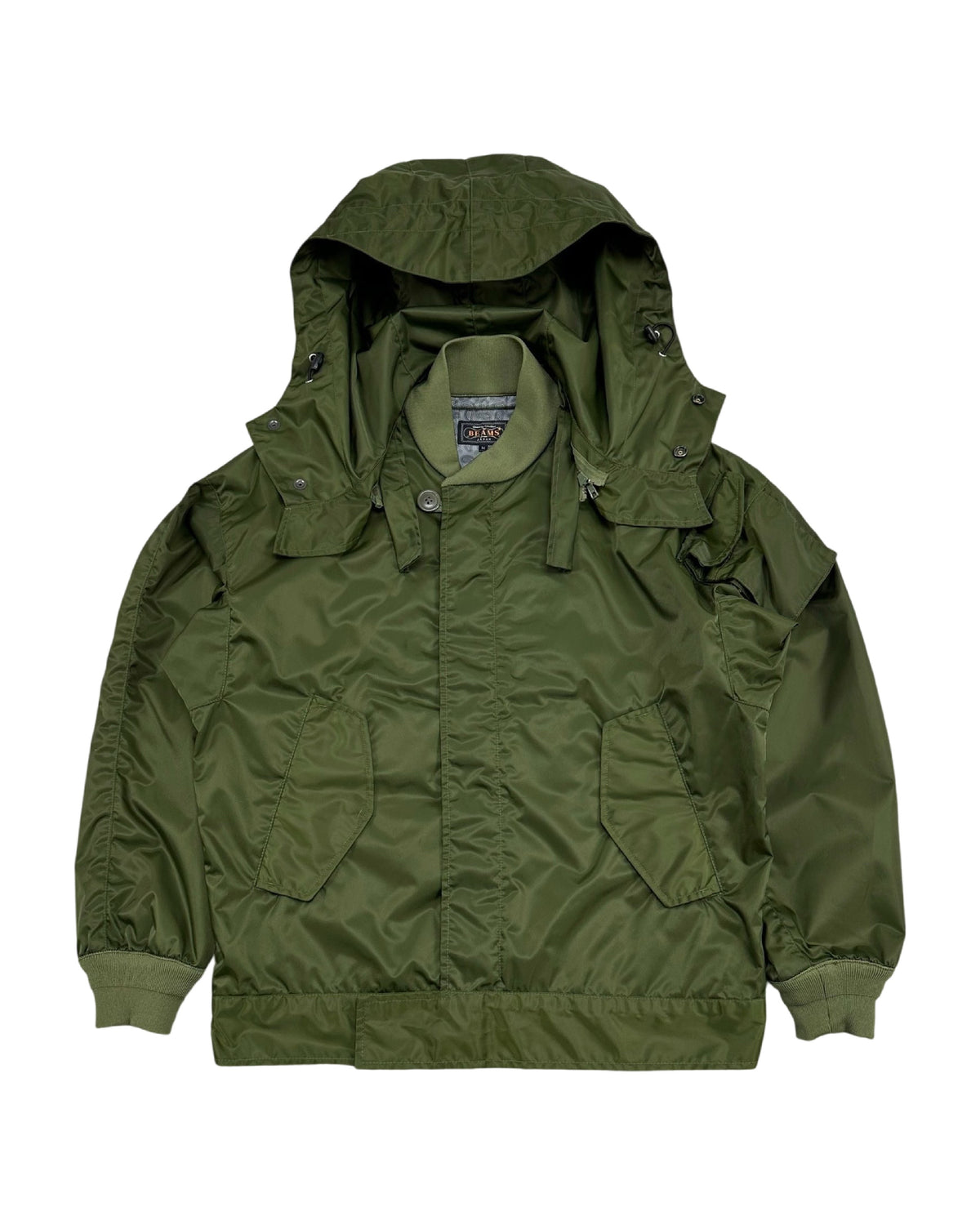 Beams Plus 2019AW hooded nylon submarine jacket - front view on hanger, Type A-1 deck jacket with removable hood